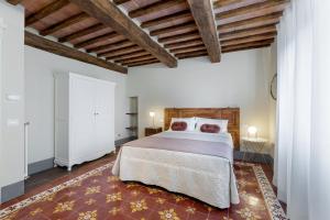 Łóżko lub łóżka w pokoju w obiekcie B&B Gli Archi