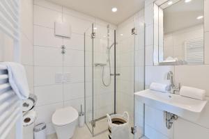 Ein Badezimmer in der Unterkunft Hotel- & Ferienanlage Kapitäns-Häuser Breege