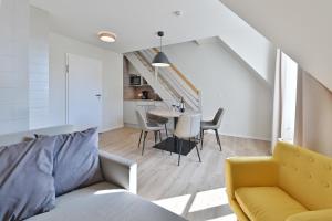 Ein Sitzbereich in der Unterkunft Hotel- & Ferienanlage Kapitäns-Häuser Breege