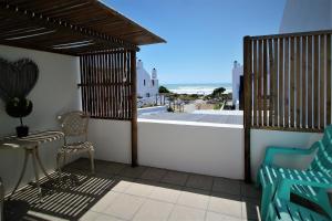 A balcony or terrace at Baywatch Guest House