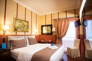 Postel nebo postele na pokoji v ubytování Anastazia Luxury Suites & Spa