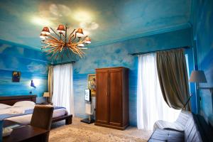 Postel nebo postele na pokoji v ubytování Anastazia Luxury Suites & Spa