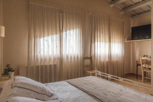 Posteľ alebo postele v izbe v ubytovaní El Moli de Siurana