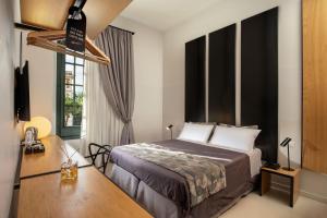 Ліжко або ліжка в номері Viminale View Hotel