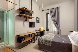 Ліжко або ліжка в номері Viminale View Hotel