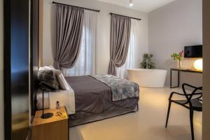 Ліжко або ліжка в номері Viminale View Hotel