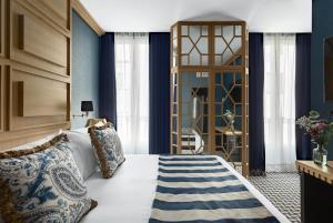 A seating area at Room Mate Collection Alba, Madrid