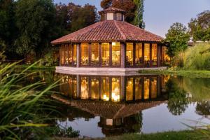 a gazebo in the middle of a pond at La Casona At Matetic Vineyards in Lagunillas