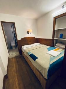 Postel nebo postele na pokoji v ubytování Souvenir Guest House