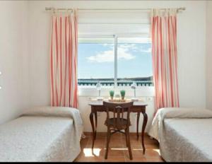 Posteľ alebo postele v izbe v ubytovaní Apartment Poris Sea View
