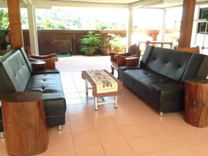Posezení v ubytování Pimpa House พิมพาเฮาส์