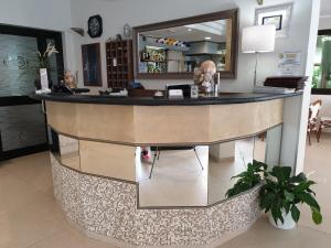 a bar in a room with a counter top at La Lanterna in Silvi Marina