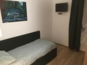 Postel nebo postele na pokoji v ubytování Agriturismo G.GARTROZ