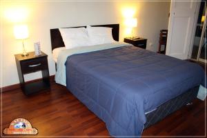 Postel nebo postele na pokoji v ubytování Hotel Náutico de Paita