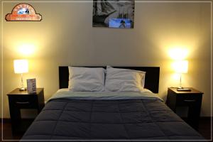 Postel nebo postele na pokoji v ubytování Hotel Náutico de Paita