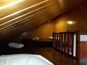 Cama ou camas em um quarto em Apartamentos Domus