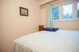 Cama ou camas em um quarto em Freeda's Place