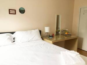 Cama ou camas em um quarto em Freeda's Place