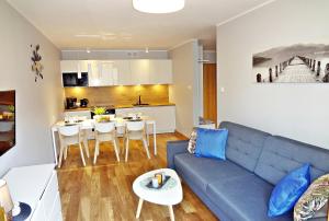 Posezení v ubytování Apartamenty Sun&Fun Rezydencja Parkowa Nadrzeczna 3D i 3E -blisko centrum, dworca PKP w otoczeniu zieleni