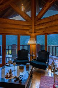 A seating area at Mythica Chalet