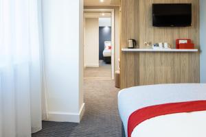 Телевизия и/или развлекателен център в Holiday Inn Express Dublin City Centre, an IHG Hotel