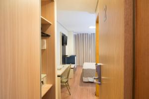 TV a/nebo společenská místnost v ubytování Hotel Financial + 31 fotografií