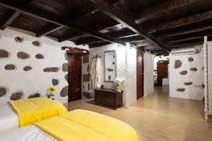 Posteľ alebo postele v izbe v ubytovaní Casa la Era