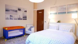 Postel nebo postele na pokoji v ubytování Three Rooms