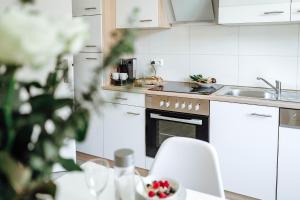 Kuchyň nebo kuchyňský kout v ubytování Ruhiges Zimmer an der TA (Nr. 4) + 3 fotografie
