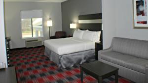 Ένα ή περισσότερα κρεβάτια σε δωμάτιο στο Holiday Inn Express & Suites Bonham by IHG