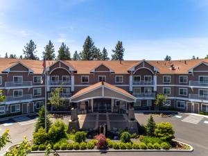 an exterior view of a large building at Holiday Inn Express Hotel & Suites Coeur D'Alene I-90 Exit 11 by IHG in Coeur d'Alene