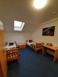 Postel nebo postele na pokoji v ubytování Coin Hotel