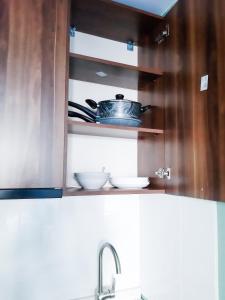Kuchyň nebo kuchyňský kout v ubytování Новый Гудаури Loft 2 + 29 fotografií