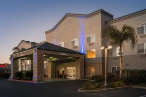 a rendering of the front of a hotel at Holiday Inn Express Rocklin - Galleria Area, an IHG Hotel in Rocklin