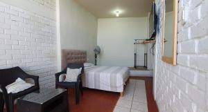 Postel nebo postele na pokoji v ubytování B&B Las Playitas