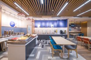 A kitchen or kitchenette at Holiday Inn Express Shanghai Jiading Center, an IHG Hotel