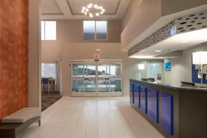 a lobby of a hospital with a waiting room at Holiday Inn Express Rocklin - Galleria Area, an IHG Hotel in Rocklin