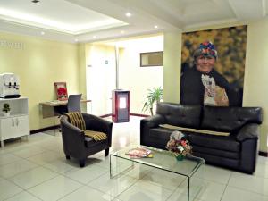 Ein Sitzbereich in der Unterkunft Hotel Newen
