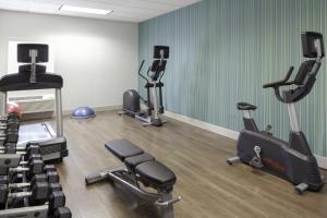 a gym with several exercise bikes and tread machines at Holiday Inn Express Myrtle Beach-Broadway at the Beach, an IHG Hotel in Myrtle Beach