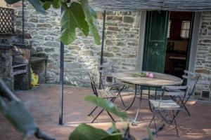 a table and chairs sitting on a patio at Baccio di Magio in Arezzo