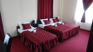 سرير أو أسرّة في غرفة في Villa Bastion