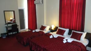 Voodi või voodid majutusasutuse Villa Bastion toas