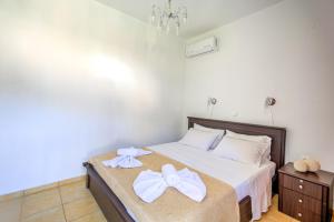 Postel nebo postele na pokoji v ubytování Villa Vadim