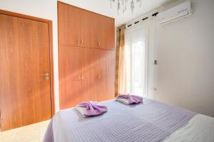 Postel nebo postele na pokoji v ubytování Villa Vadim
