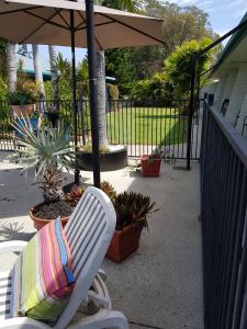 Balkón nebo terasa v ubytování Peppercorn Motel