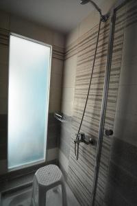 Vonios kambarys apgyvendinimo įstaigoje Kavala marina view studio