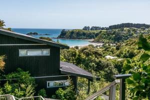 a house with a view of the ocean at Luxury at Palm Beach - You've Got It Maid in Palm Beach
