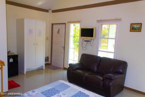 Μια τηλεόραση ή/και κέντρο ψυχαγωγίας στο Cottages @ Hill Resort