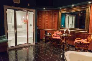 A bathroom at Mariaggi's Theme Suite Hotel & Spa