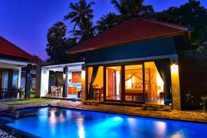Sundlaugin á Coco Garden Pool Villas eða í nágrenninu